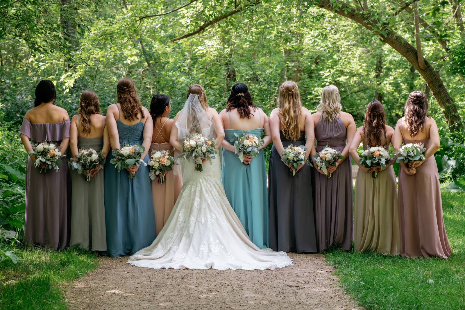 bridesmaids showing the back of their dresses