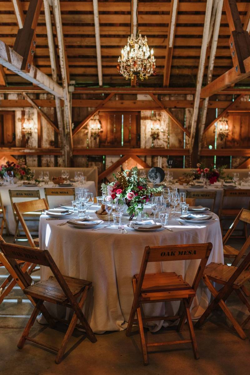 barn wedding, chandelier, farm tables, organic, rustic, centerpiece