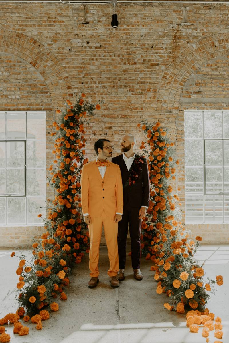 A WES ANDERSONINSPIRED MARIGOLD + PURPLE COLORBLOCKED WEDDING DESIGN