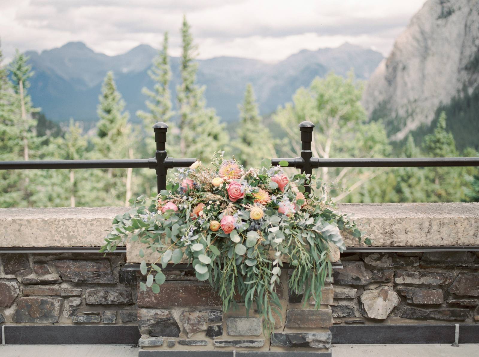 a beautiful bespoke arrangement adorns a ceremony alter at the Fairmont Banff Springs hotel