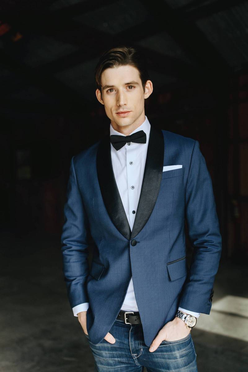 Groom shot in suit jacket and jeans