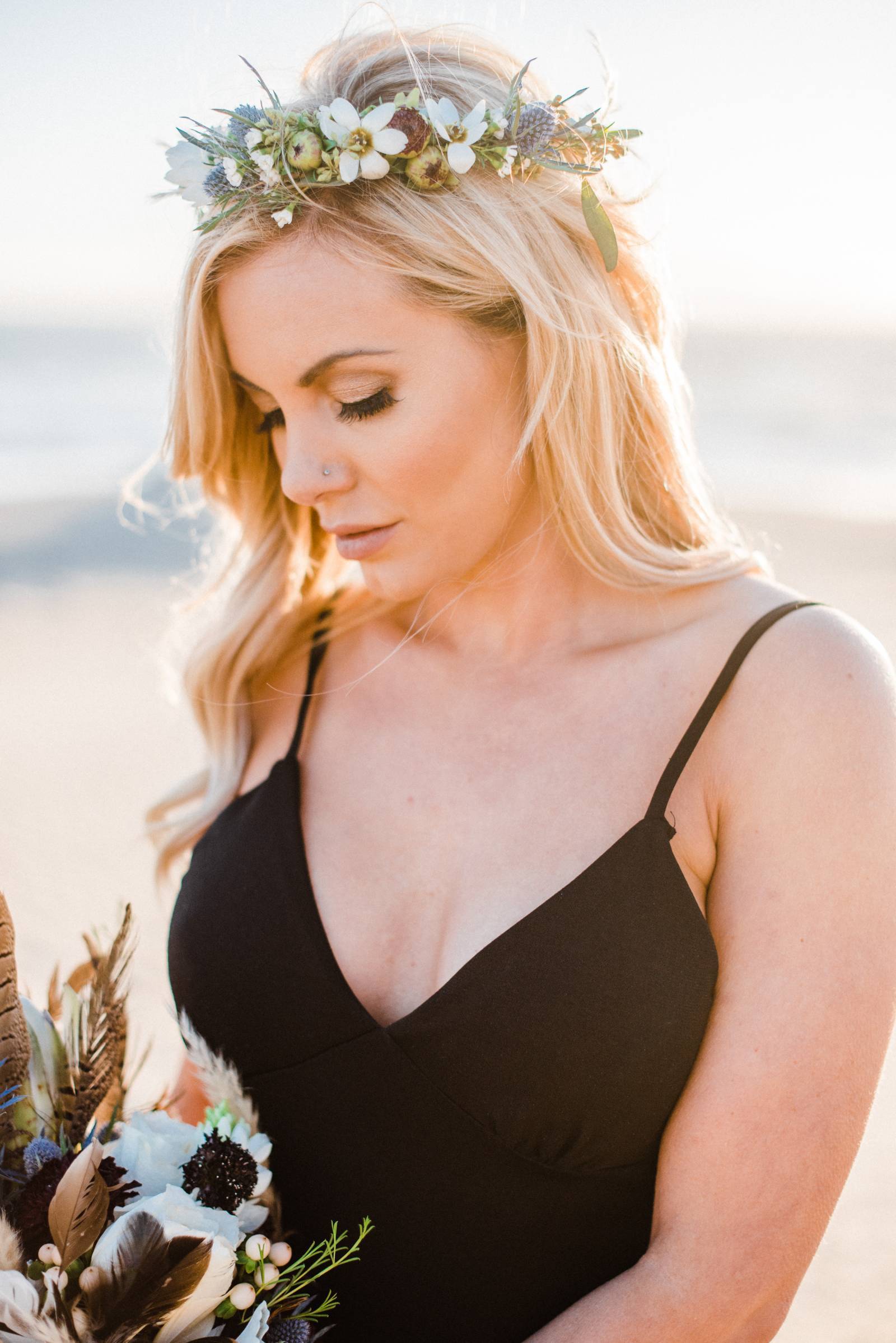 bride holding flowers.