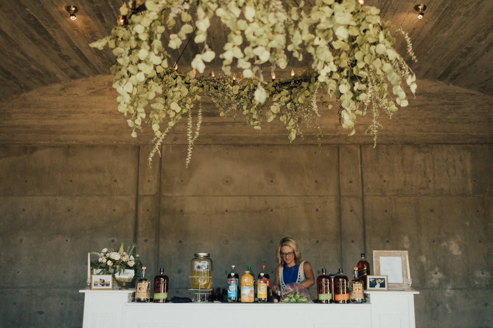 The Girl Preparing the Drinks For the Guests in the Wedding | The Wedding Standard