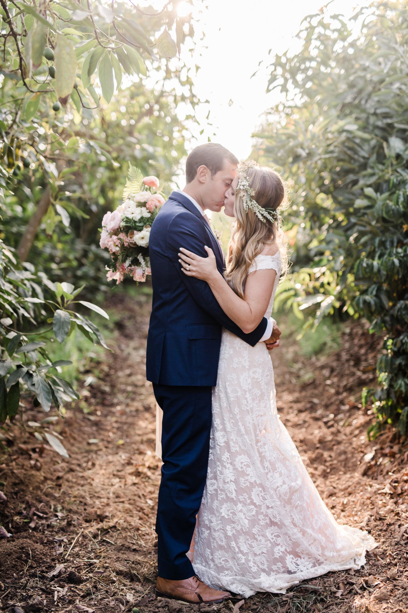The Newly Married Couple Kissing in the Woods | The Wedding Standard
