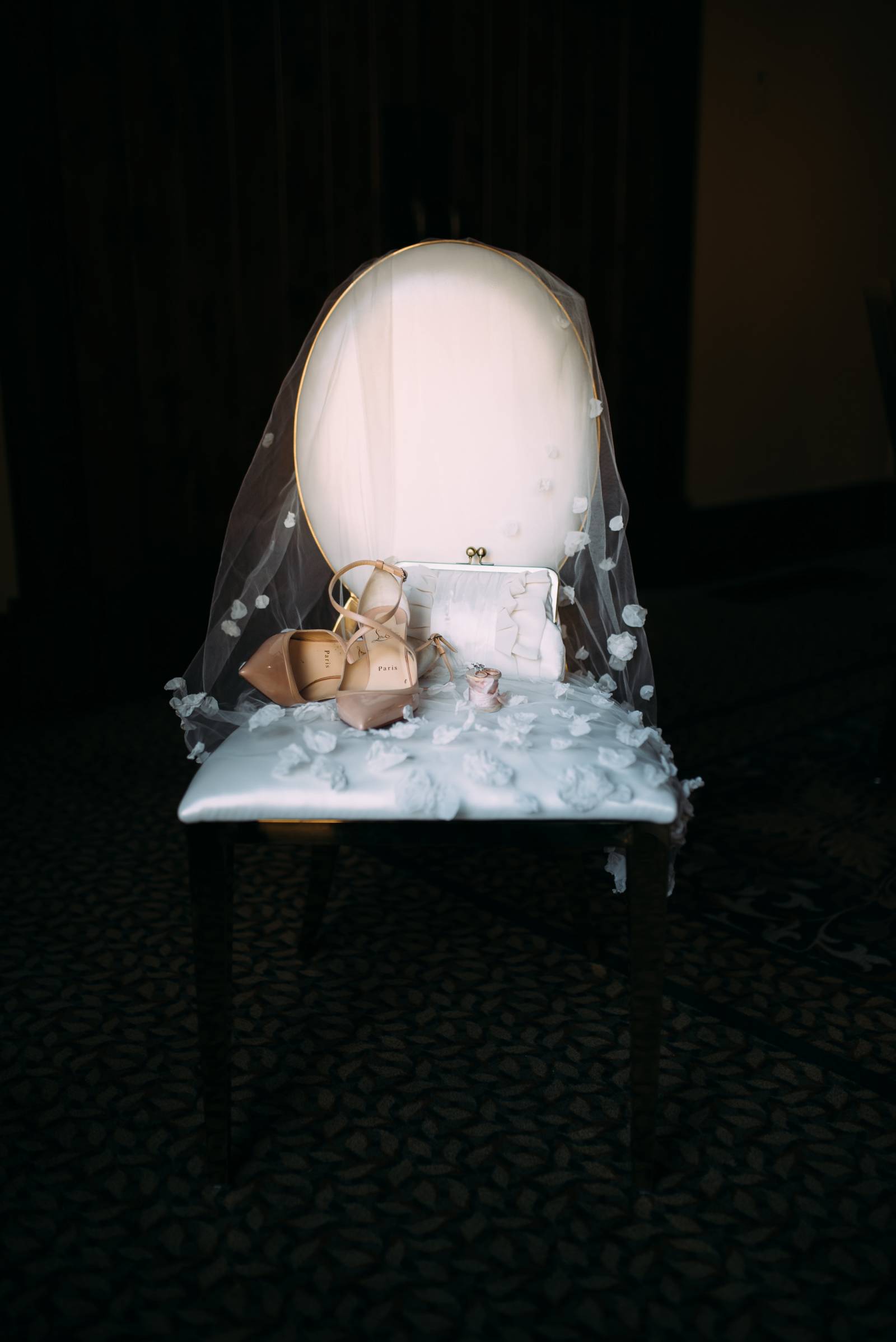 bride's vail and nude wedding shoes