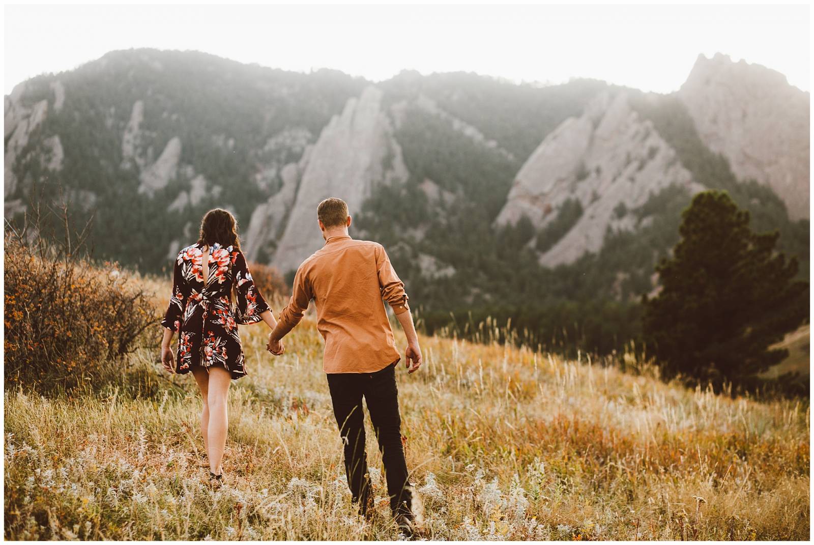 Rocky Mountain engagement photo | couple holding hands