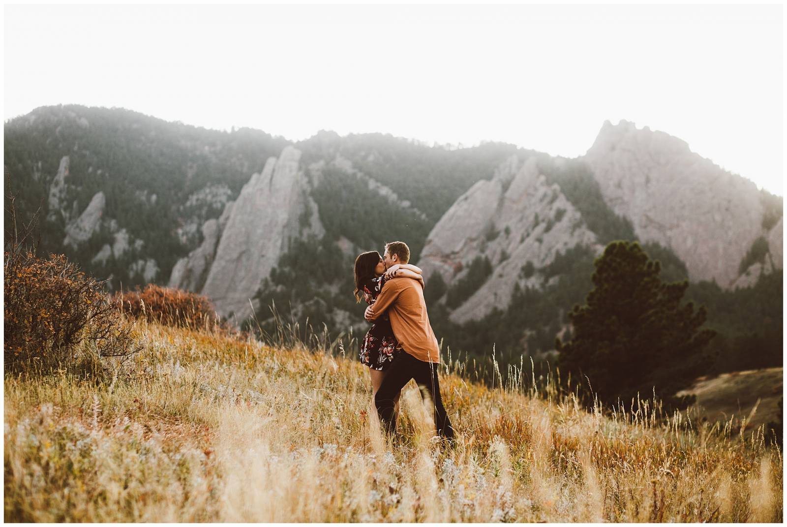 Couple kissing | moody Rocky Mountain engagement photo inspiration