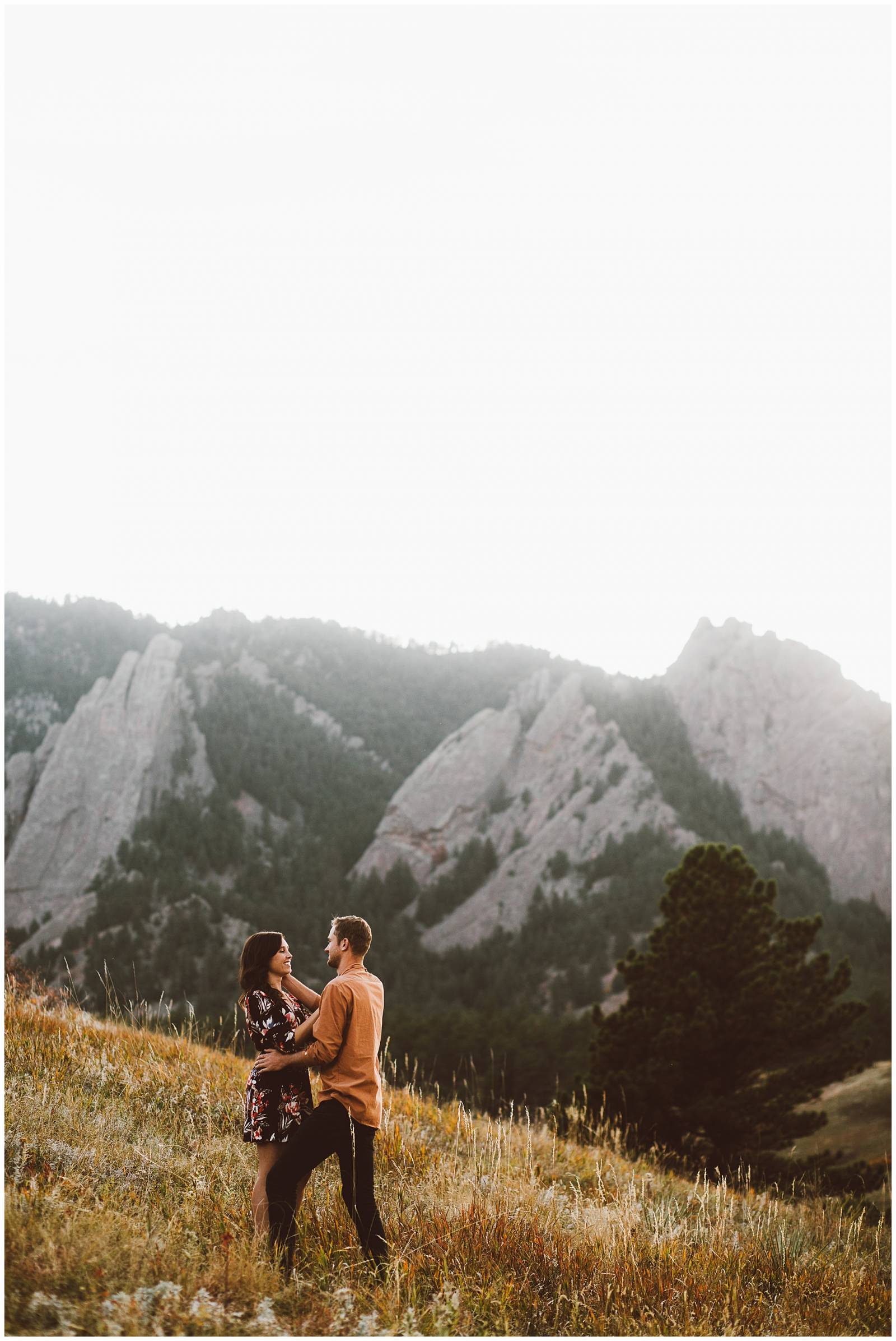 moody Rocky Mountain engagement photos | young couple in love