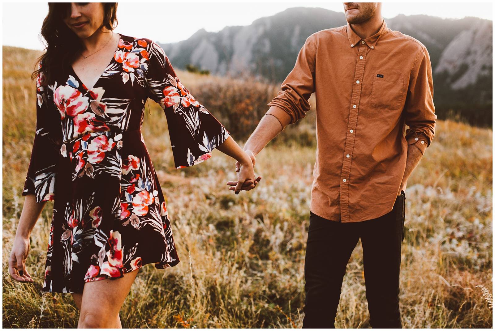 young couple holding hands | moody engagement photo inspiration