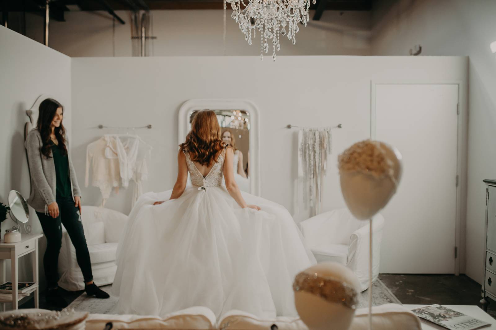 bride to be trying on wedding gowns at Emma and Grace in Denver Colorado