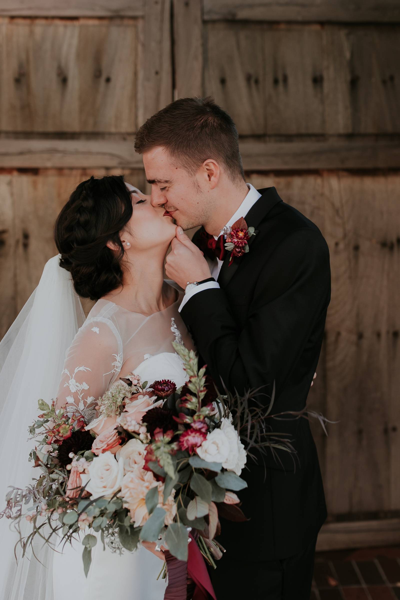 bride and groom kissing outside at Sante Fe wedding