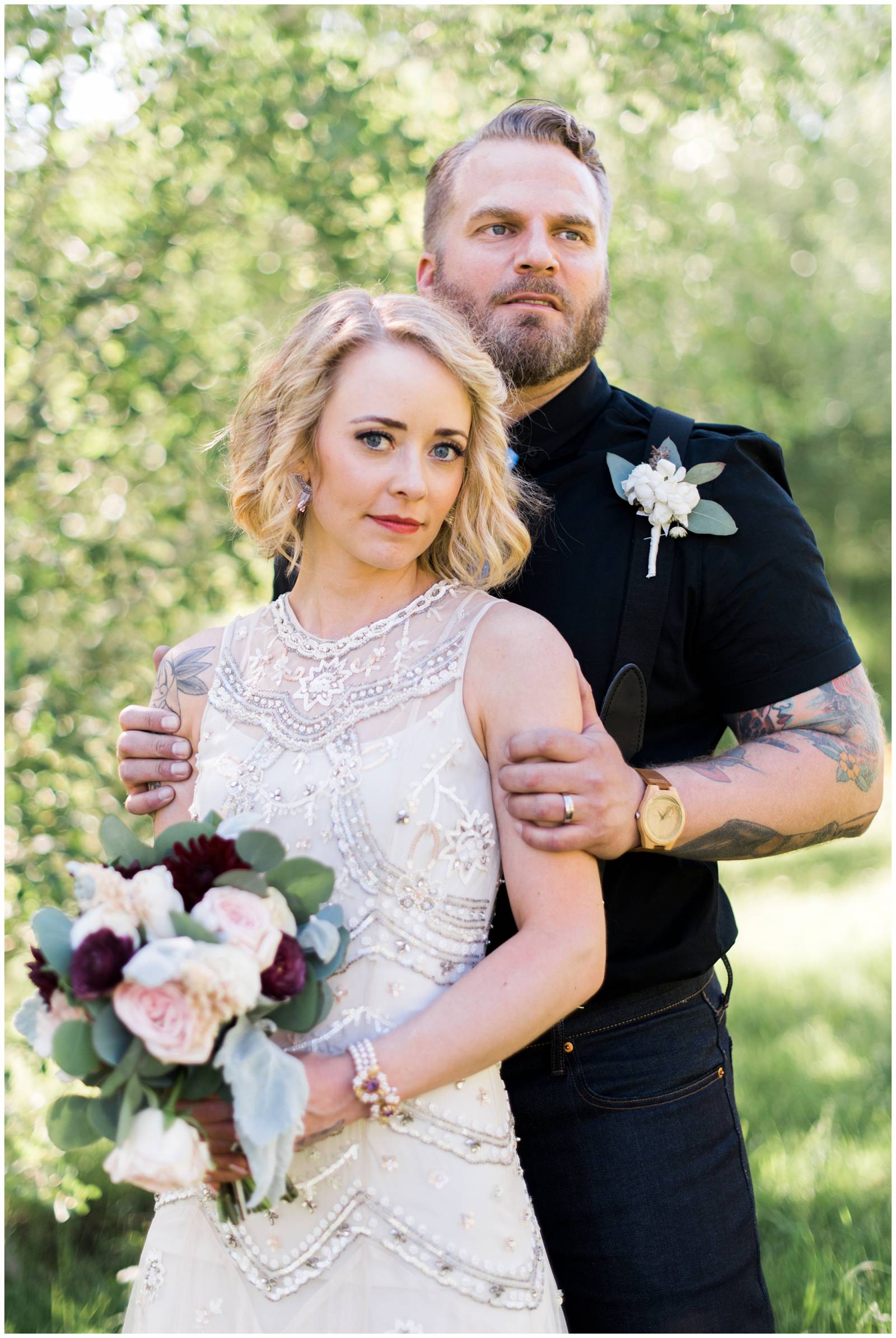 bride in BHLDN wedding gown standing with groom