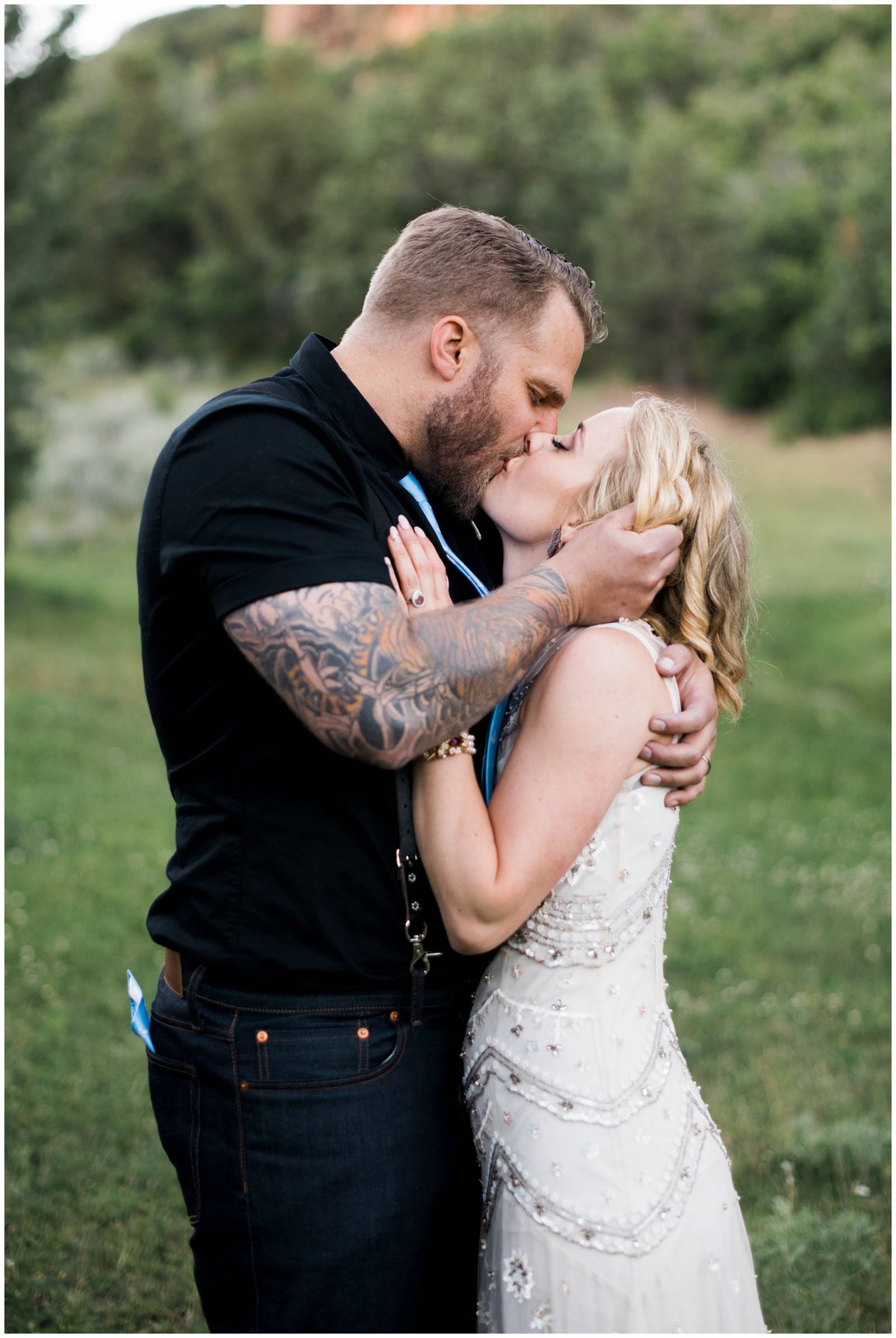 bride and groom kissing captured by wedding photographer Erin Elizabeth Photo