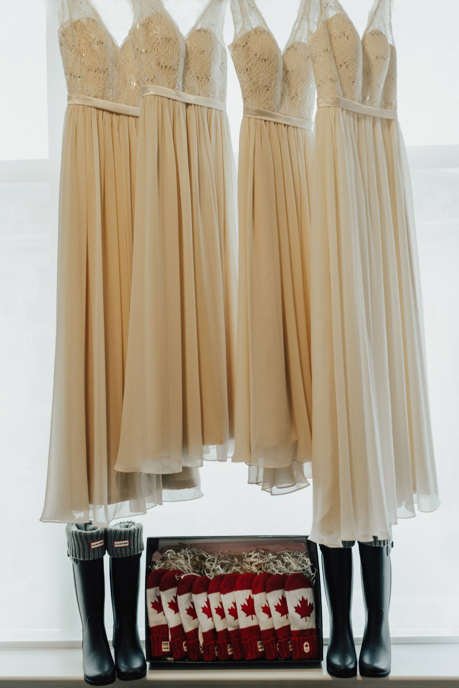 neutral bridesmaids dresses and hunter boots