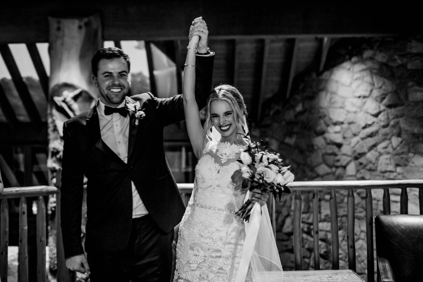 bride and groom celebrating after saying