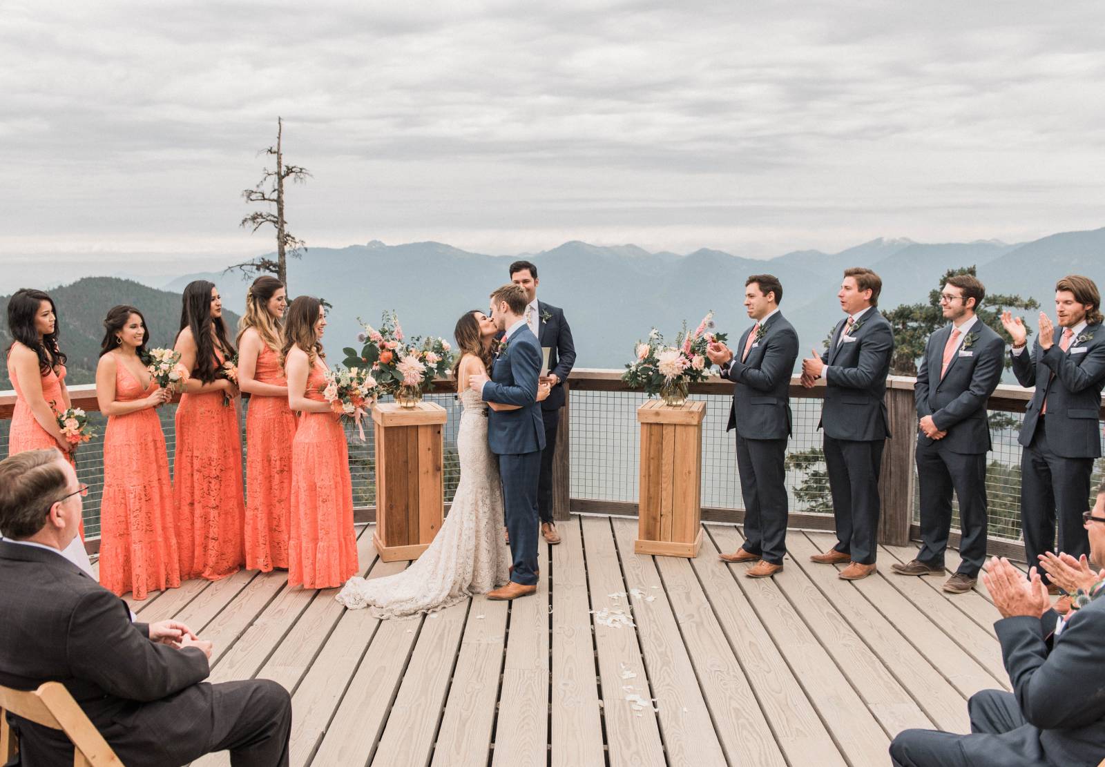 mountain top wedding ceremony | bride and groom kissing after saying