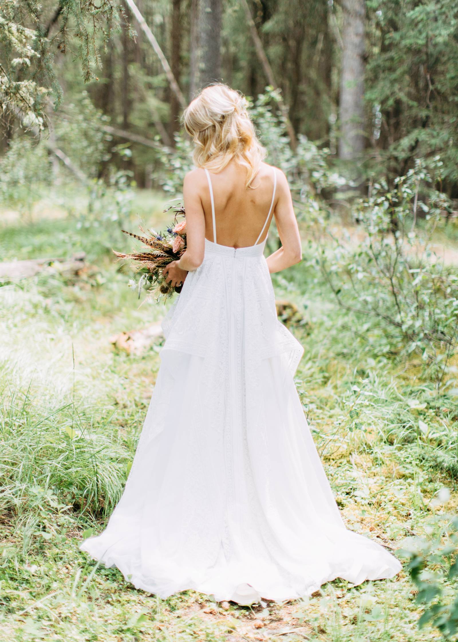 blonde bride pictured in Hayley Paige wedding dress in the Banff mountains