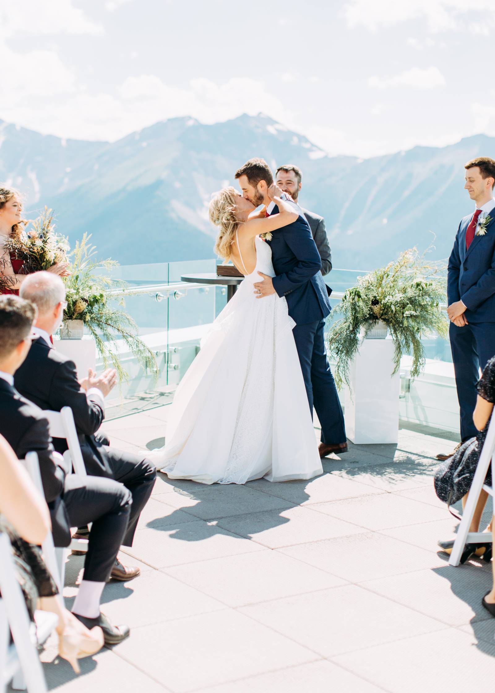 bride and groom share first kiss after saying