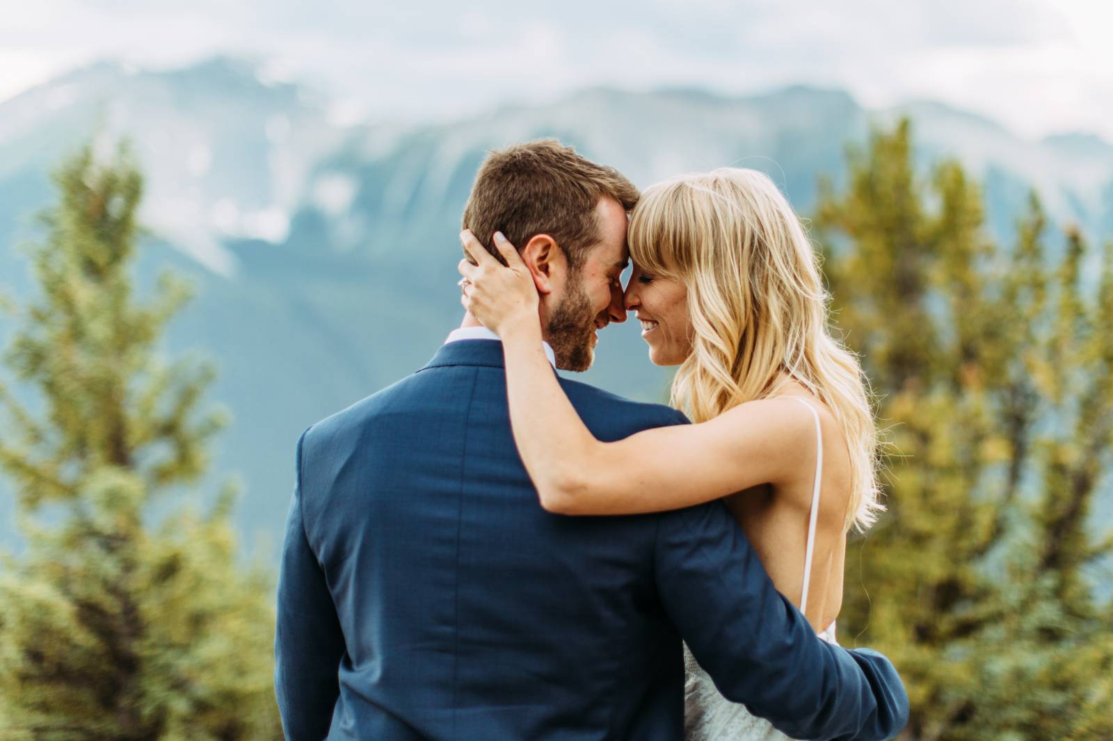 mountain top portrait of bride and groom