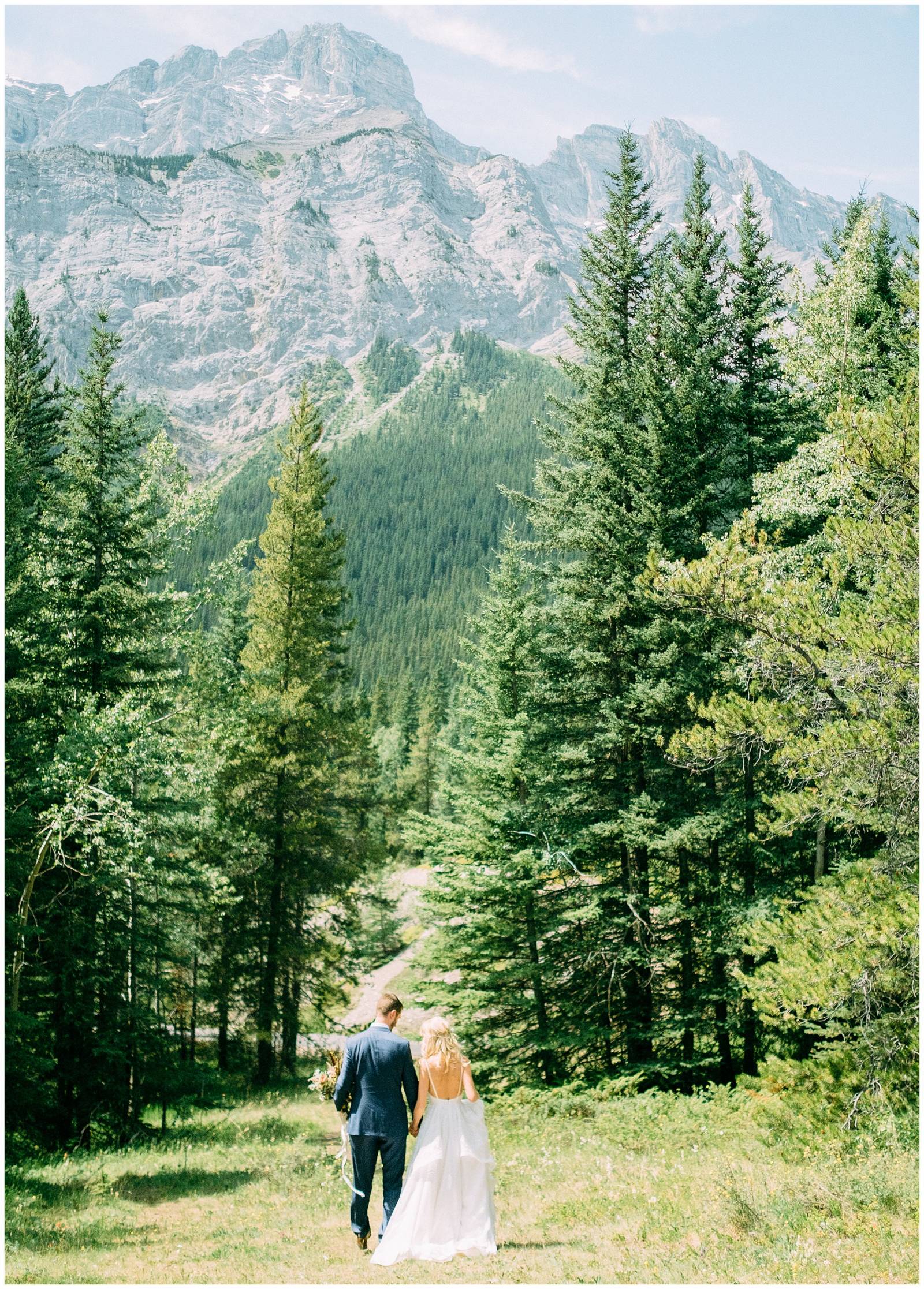 mountain portrait of bride and groom in Banff Canada