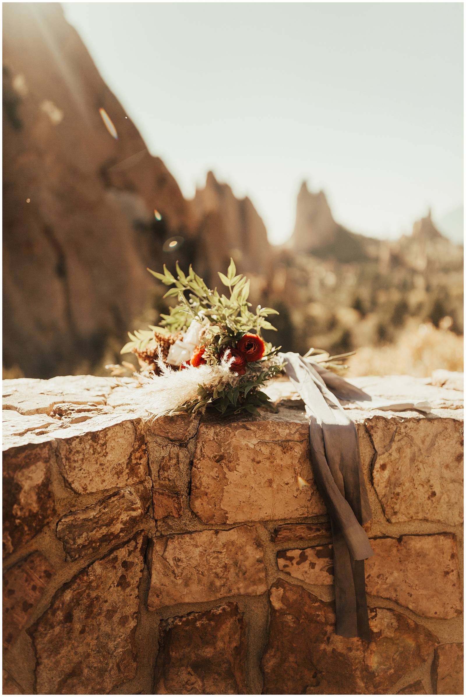 wedding bouquet sitting on ledge at the Garden of the Gods