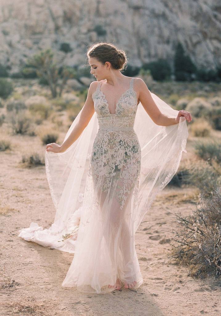 Claire Pettibone, wedding dress designer | romantic wedding gown with green undertones and flowy cap