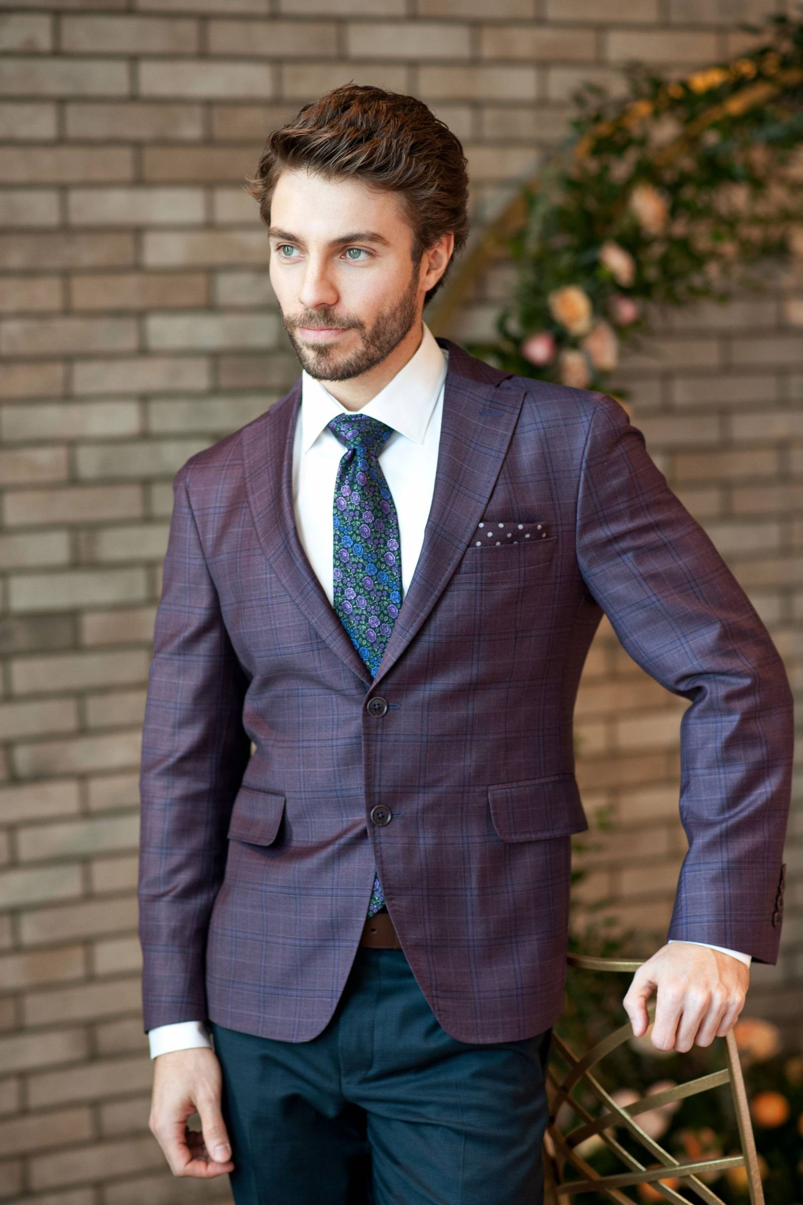 wedding day style for groom | purple suit, purple and green floral tie