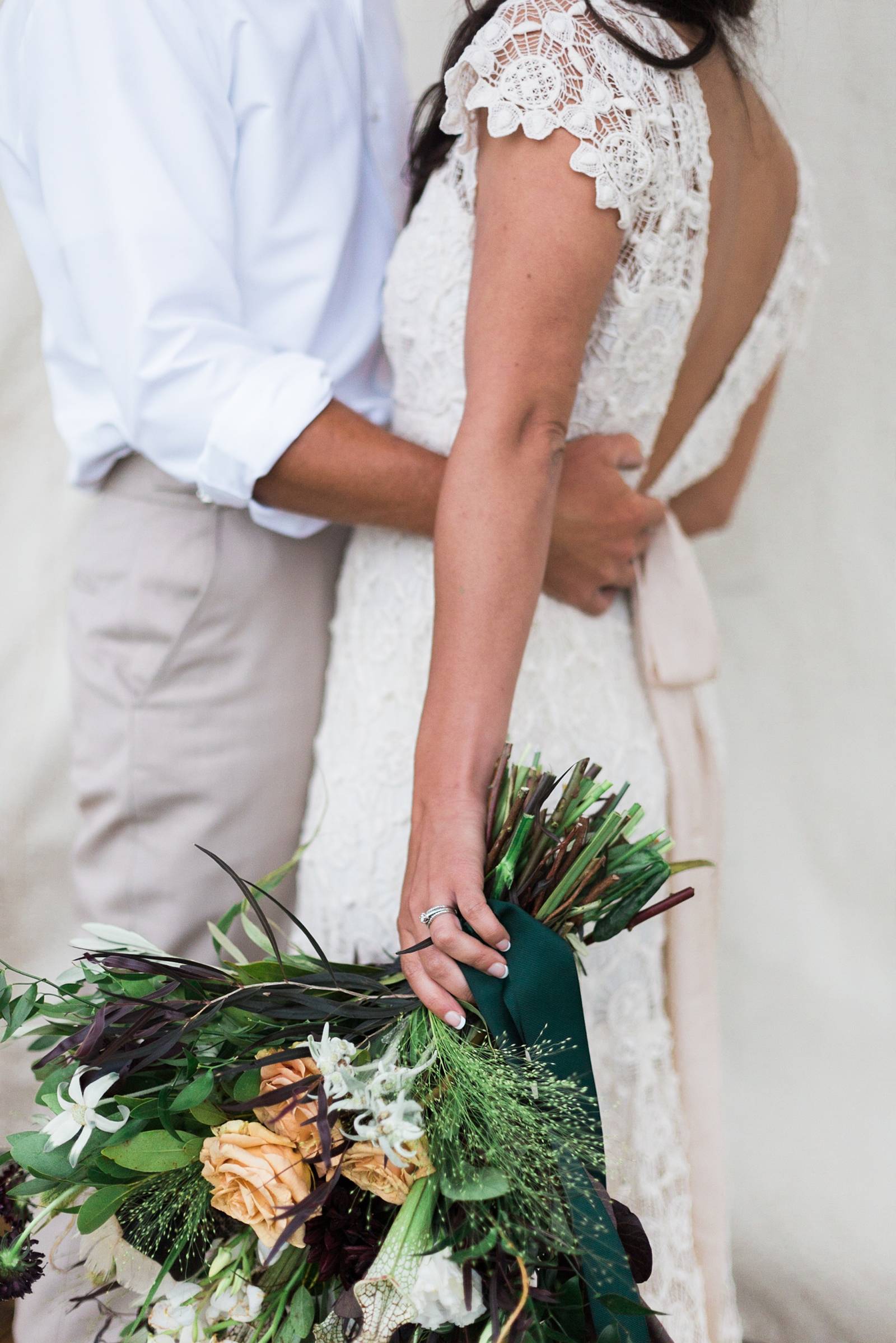 romantic bohemian portrait of bride and groom | Yellowstone Under Canvas | Montana wedding venue