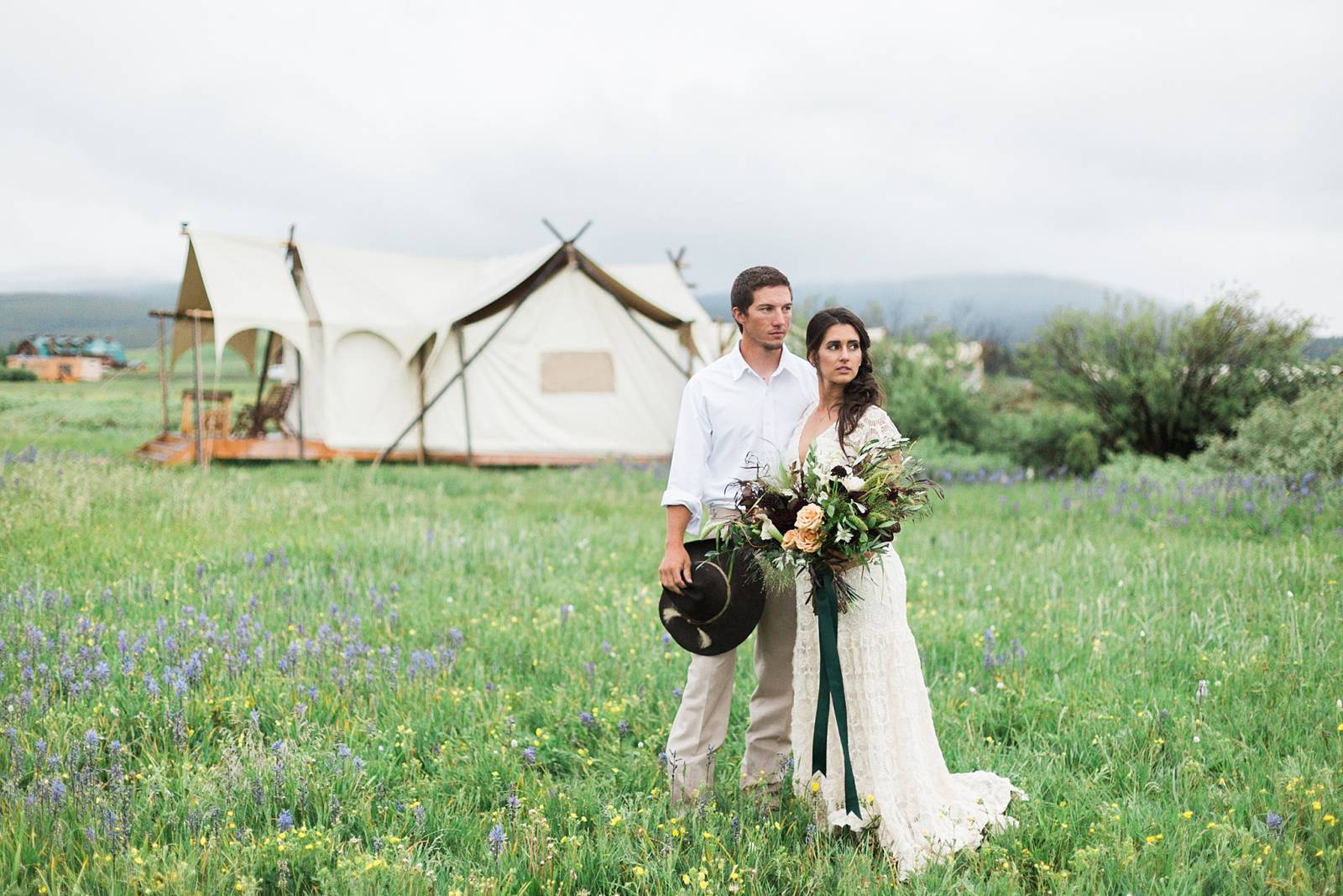 romantic bohemian portrait of bride and groom | Yellowstone Under Canvas | Montana wedding venue