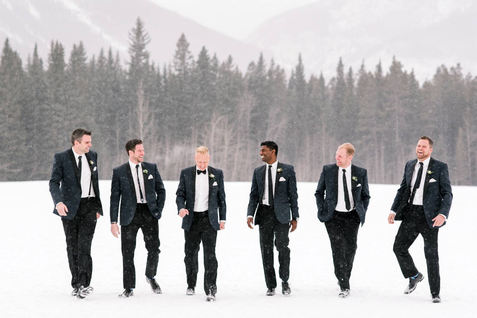 groom and groomsmen in the classic black tux | Canmore winter wedding inspiration