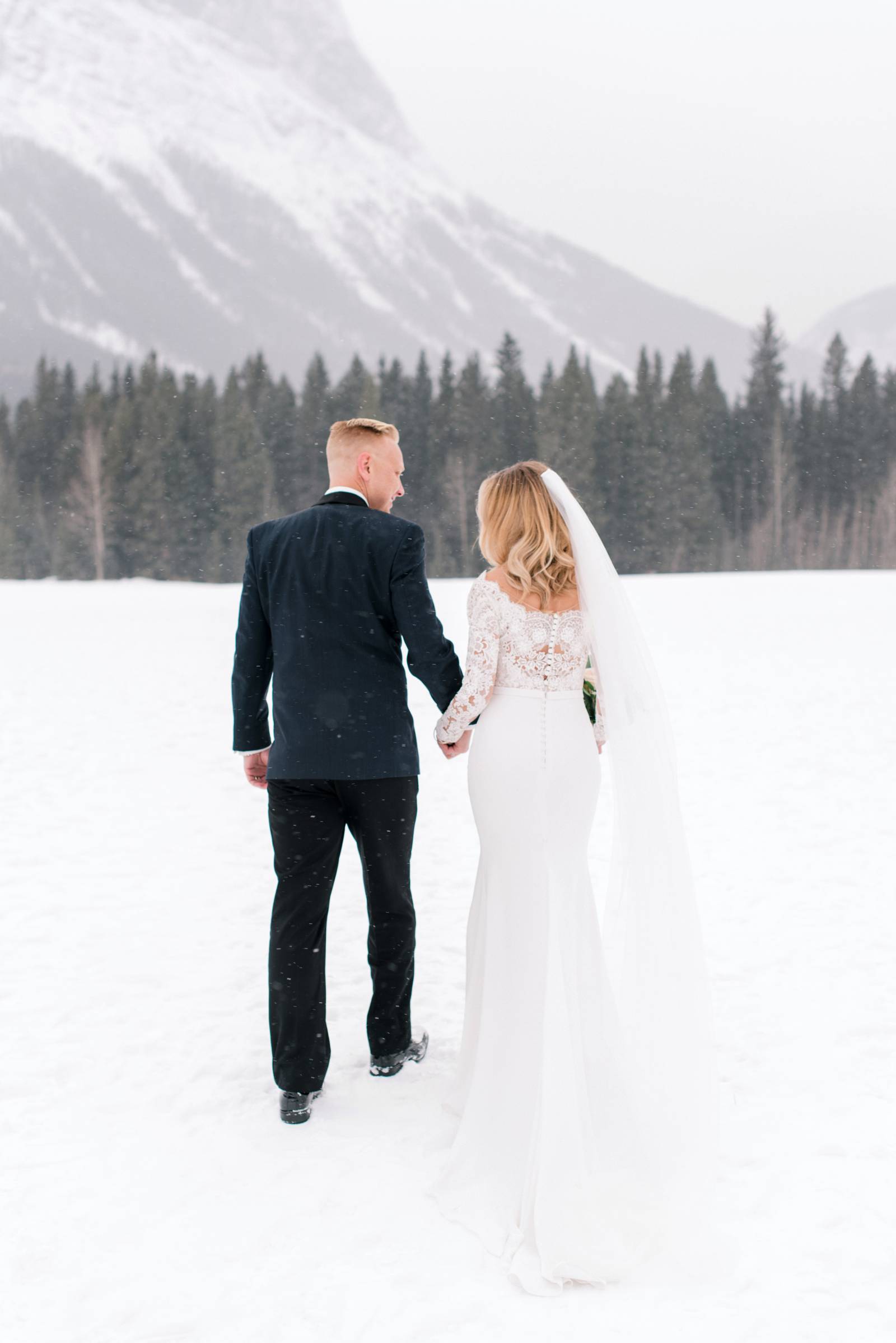classic bride and groom wedding day portrait | Canmore winter wedding inspiration