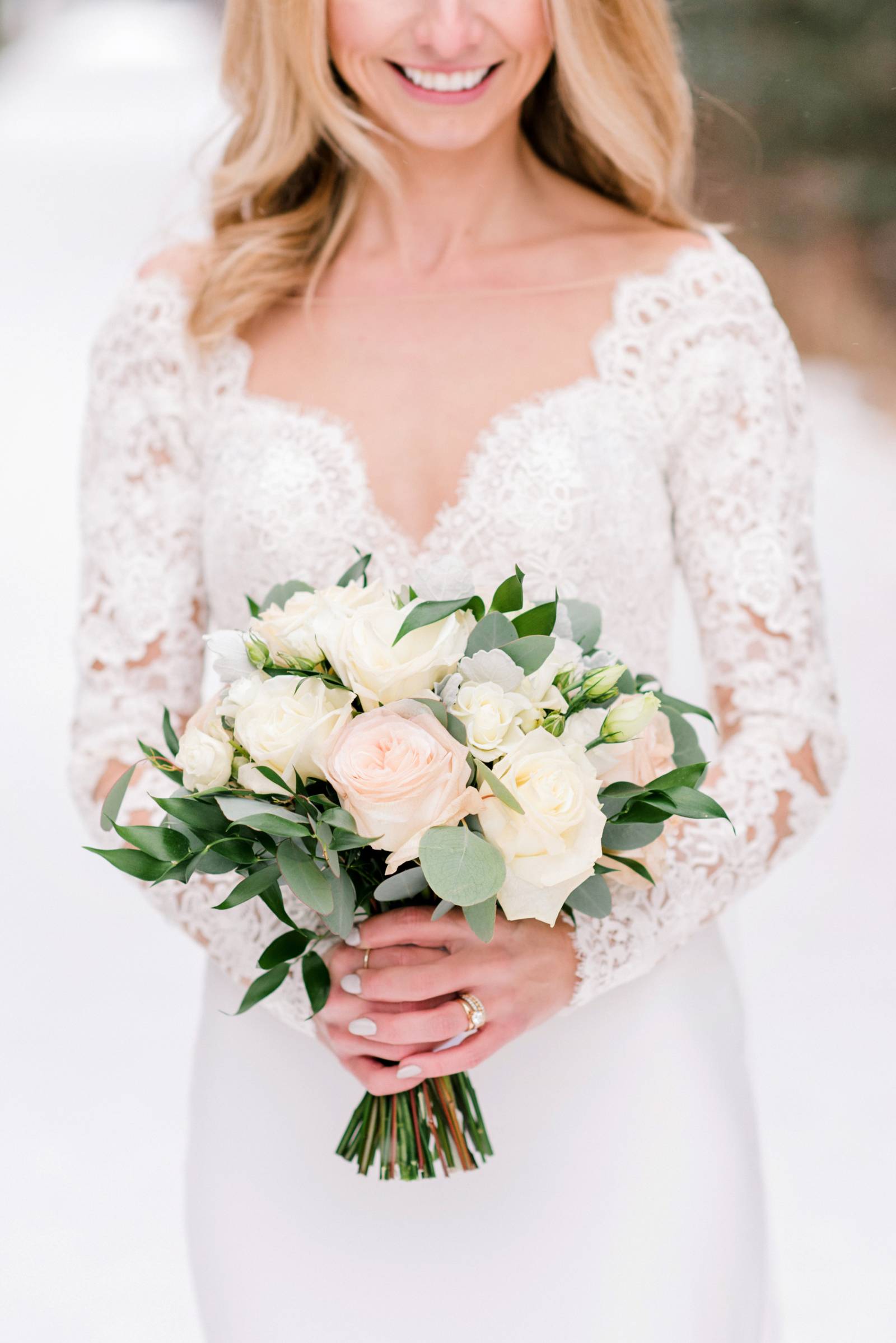 winter wedding bouquet blush pink and soft yellow flowers | Canmore winter wedding inspiration