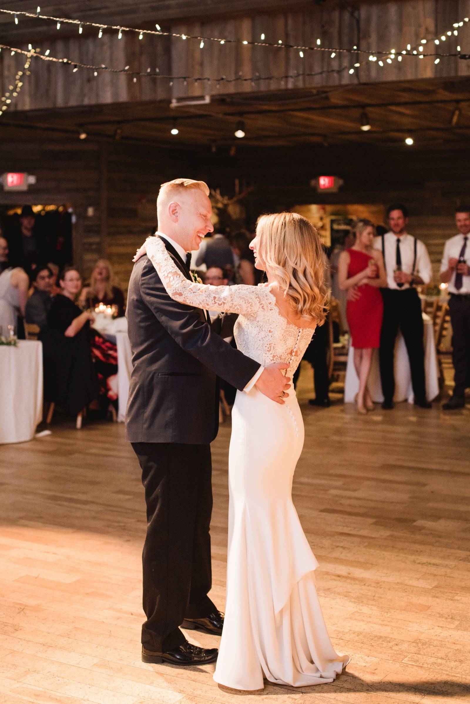 bride and groom sharing first dance | Canmore winter wedding inspiration