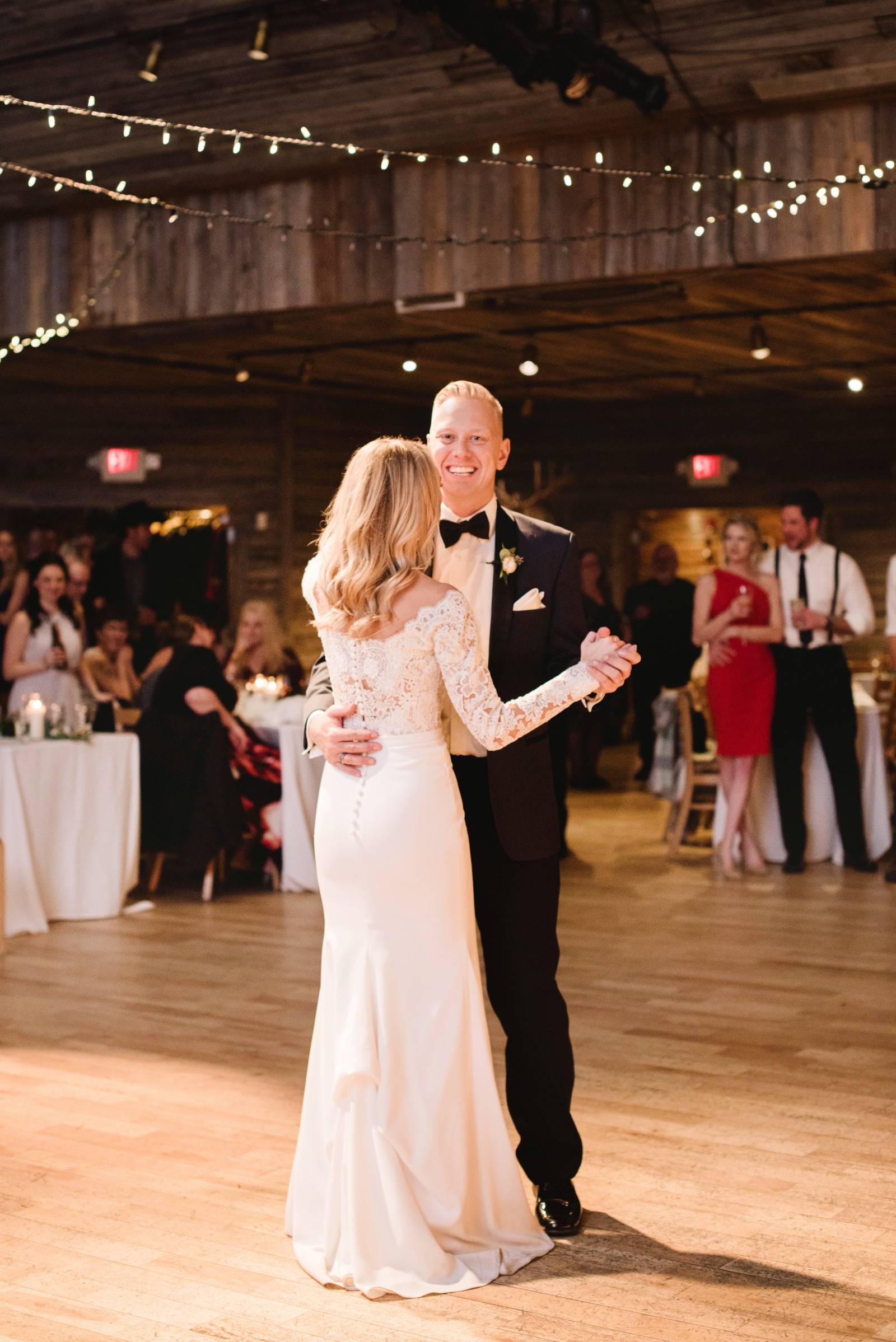 bride and groom sharing first dance | Canmore winter wedding inspiration