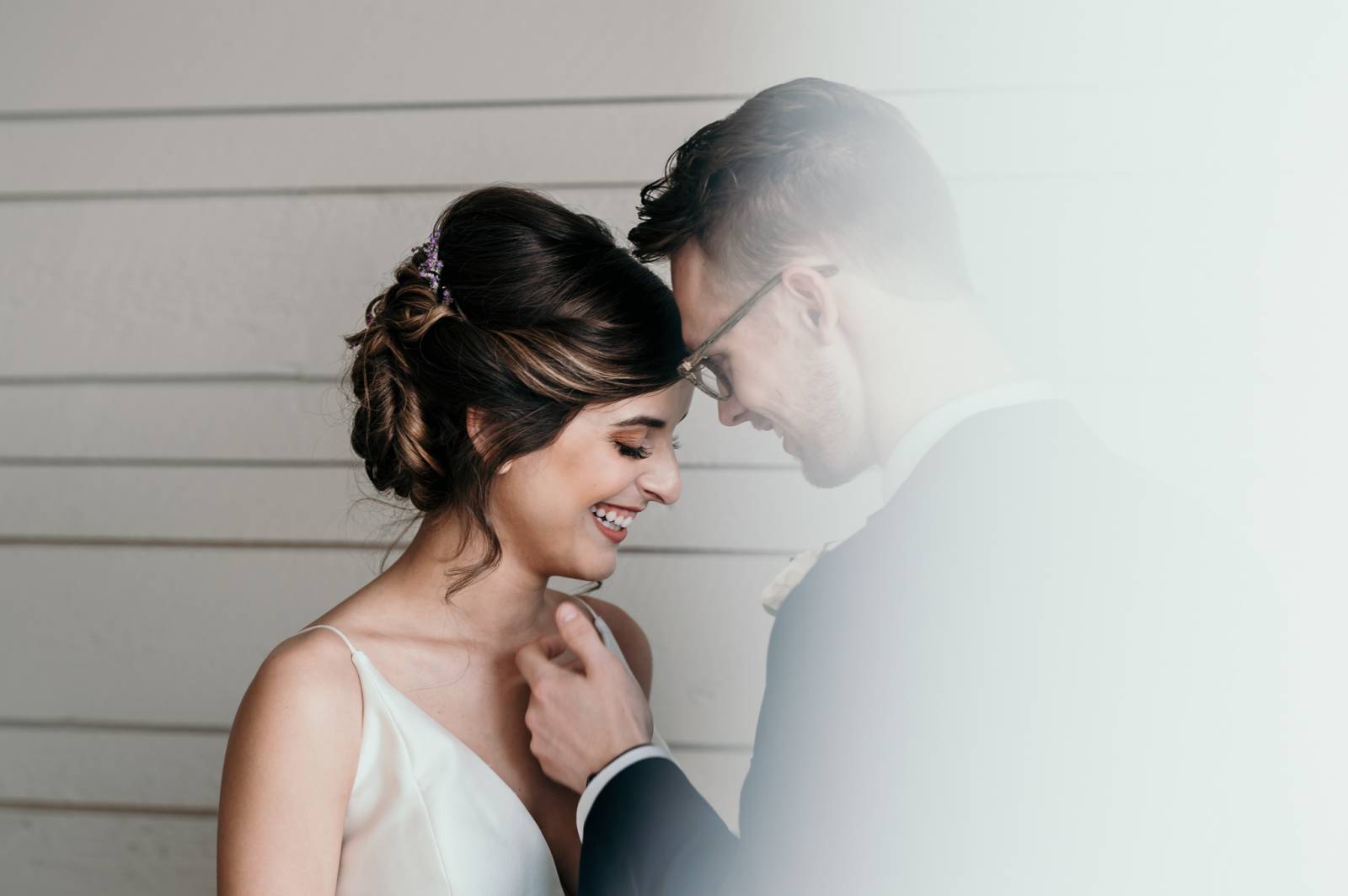 bride and groom portrait captured by Honeybee Weddings | blue and pink jewel toned wedding inspirati