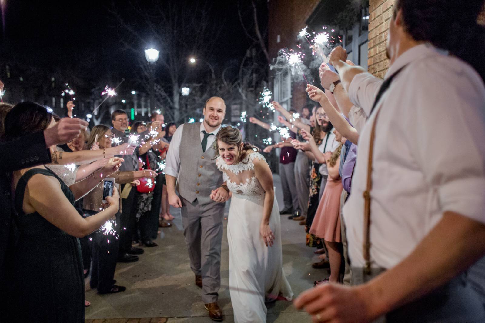 Longmont, Colorado wedding inspiration at the St. Vrain | bride and groom leaving reception