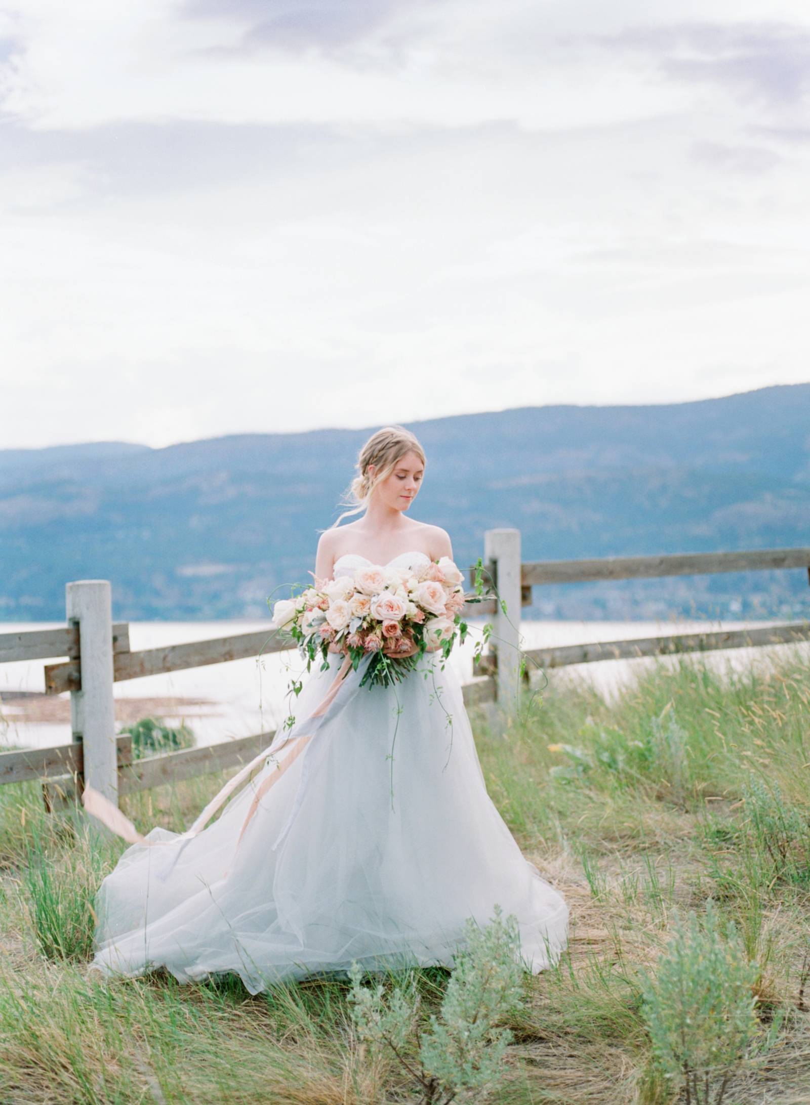 summer bridal inspiration | bride wearing wedding dress designed by Lillian Wild Bridal