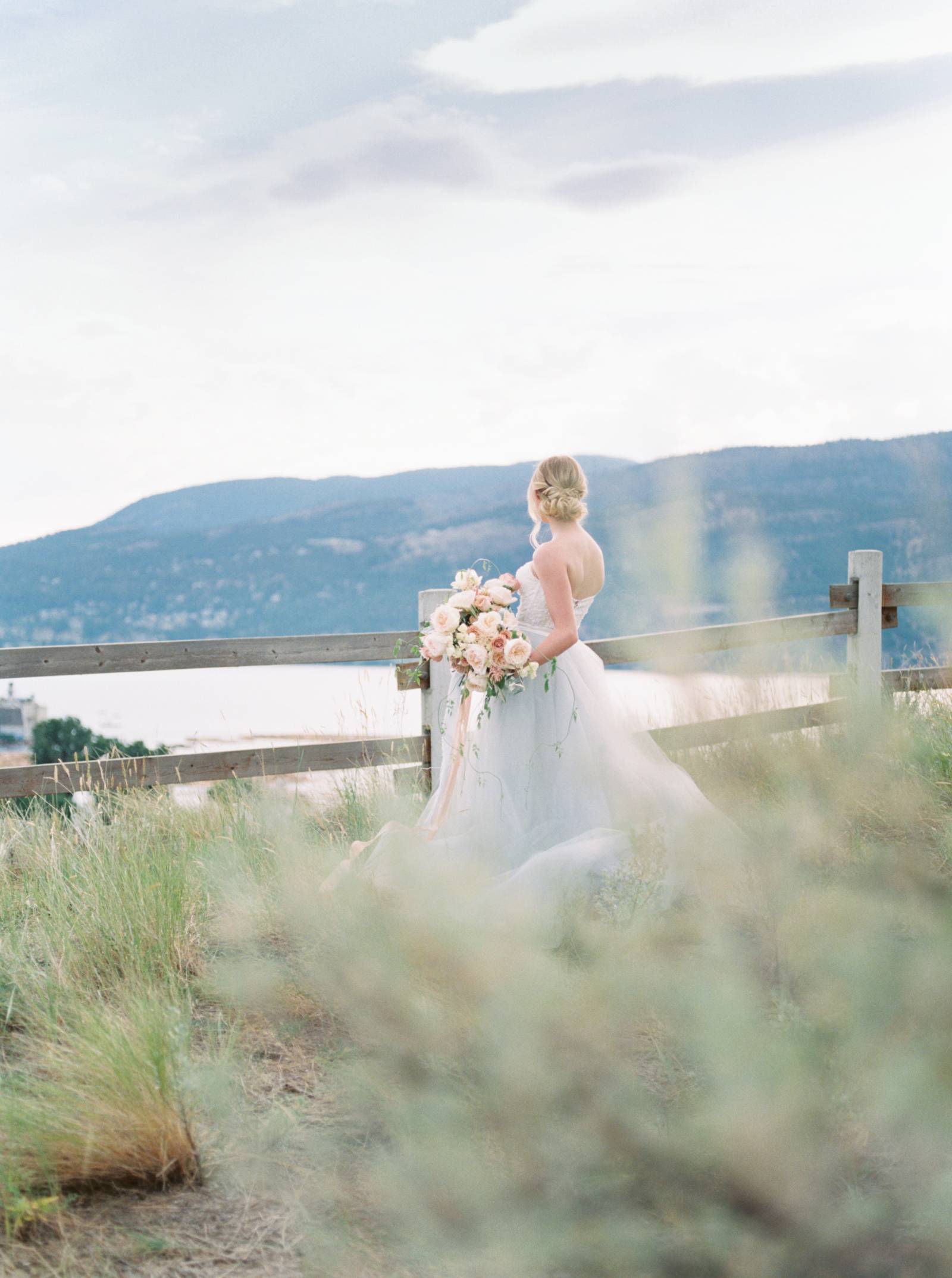 summer bridal inspiration | bride wearing wedding dress designed by Lillian Wild Bridal
