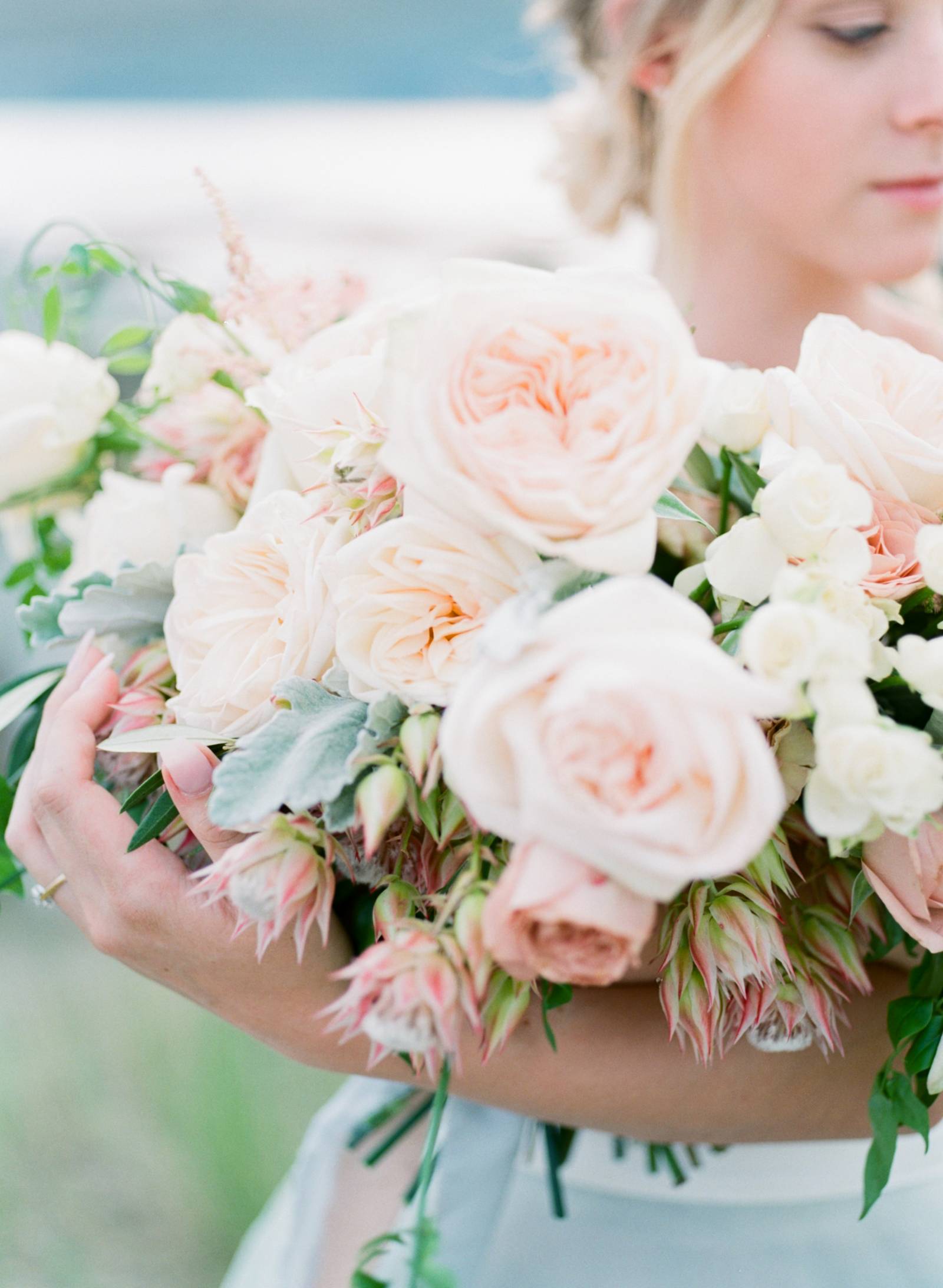 summer bridal inspiration | bride wearing wedding dress designed by Lillian Wild Bridal | bouquet