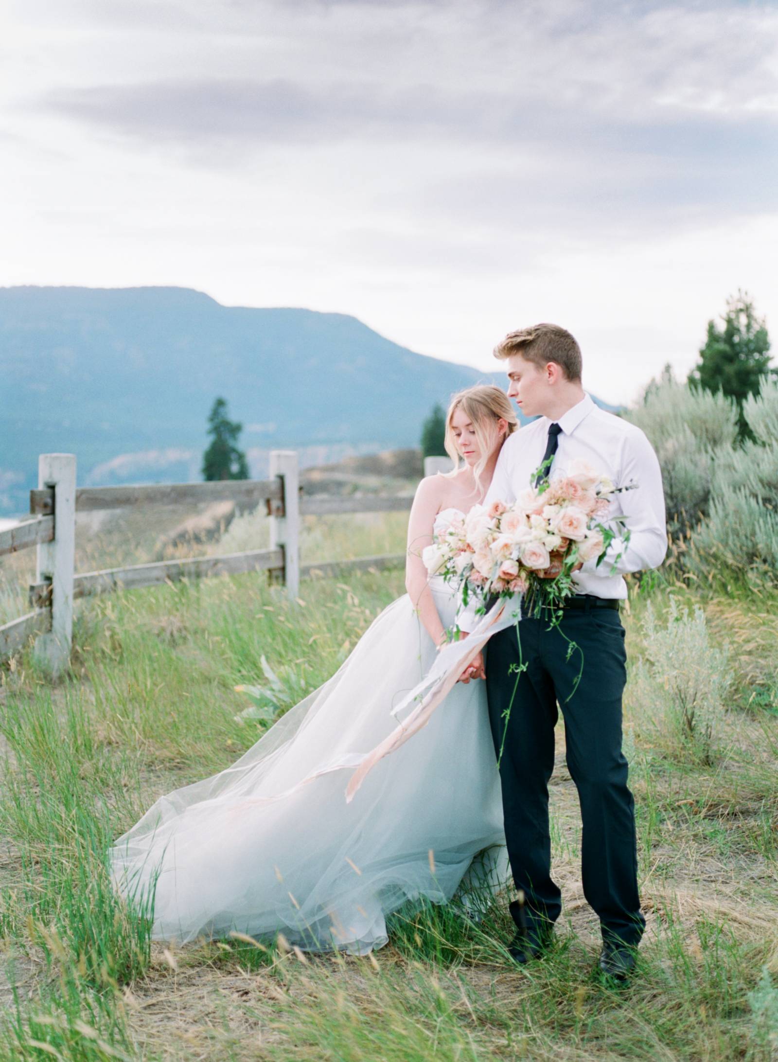 summer bridal inspiration | bride wearing wedding dress designed by Lillian Wild Bridal | bride and