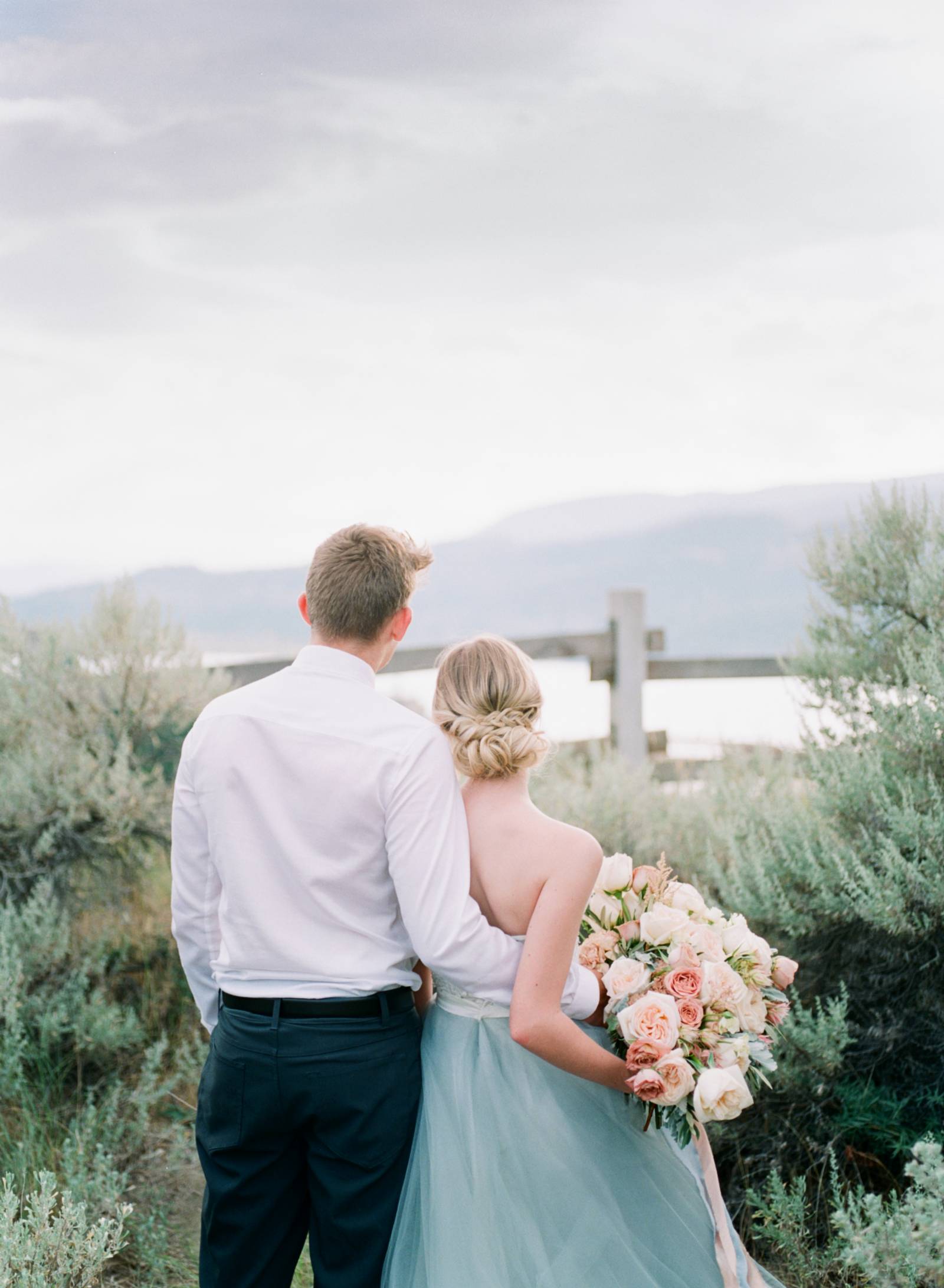 summer bridal inspiration | bride wearing wedding dress designed by Lillian Wild Bridal | bride and