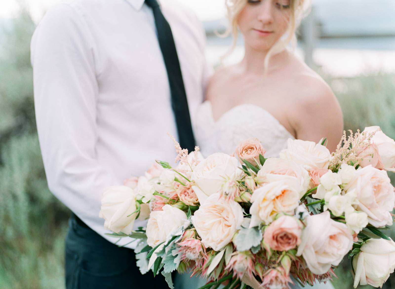 summer bridal inspiration | bride wearing wedding dress designed by Lillian Wild Bridal | bride and