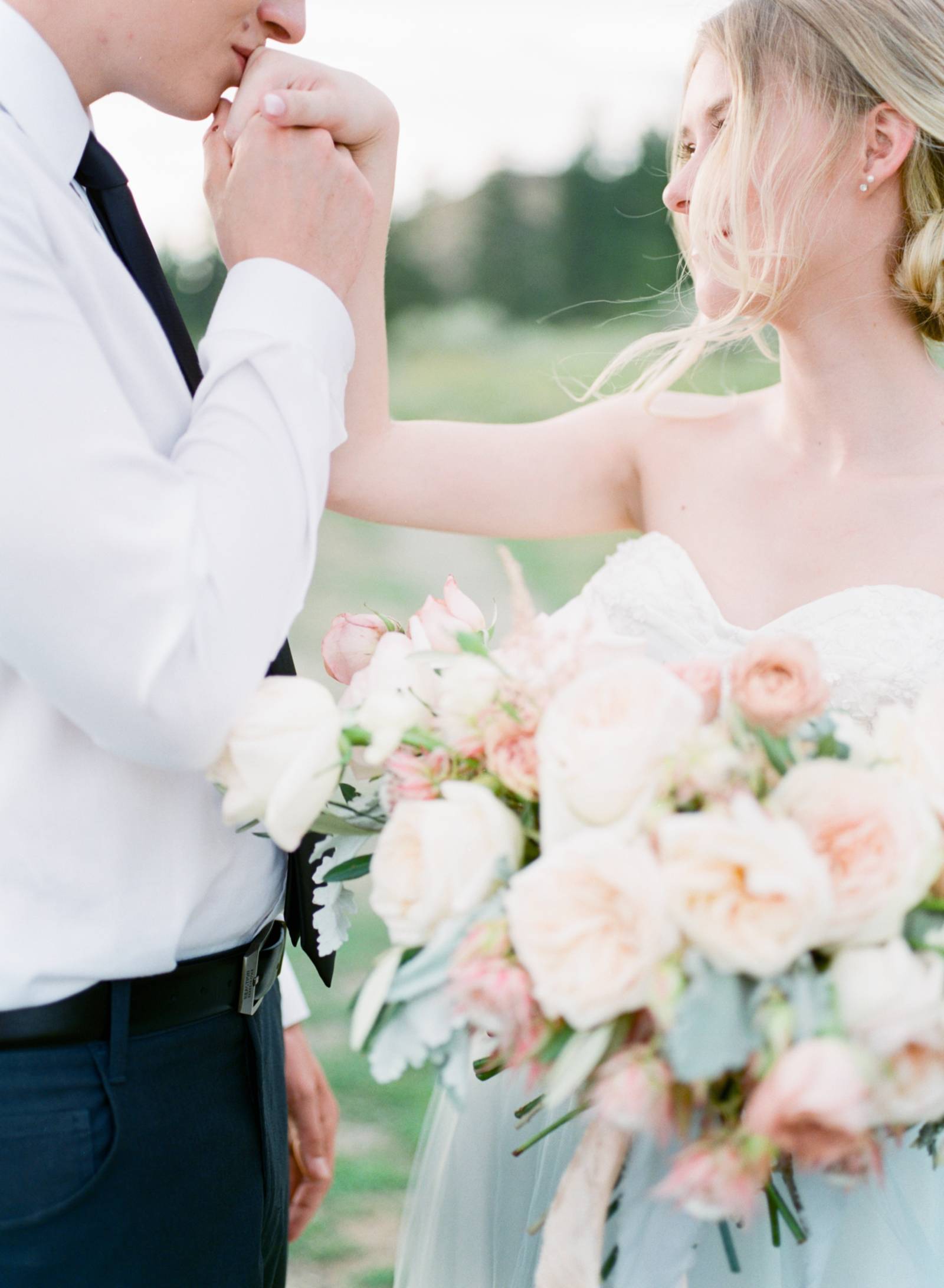 summer bridal inspiration | bride wearing wedding dress designed by Lillian Wild Bridal