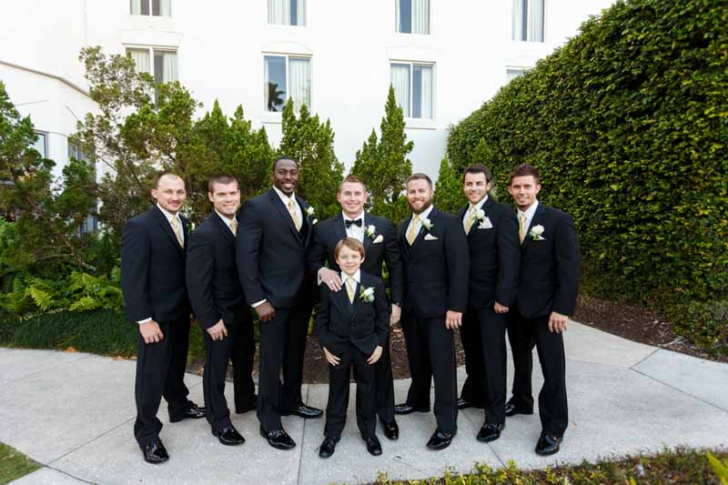 groom and groomsmen in black suits
