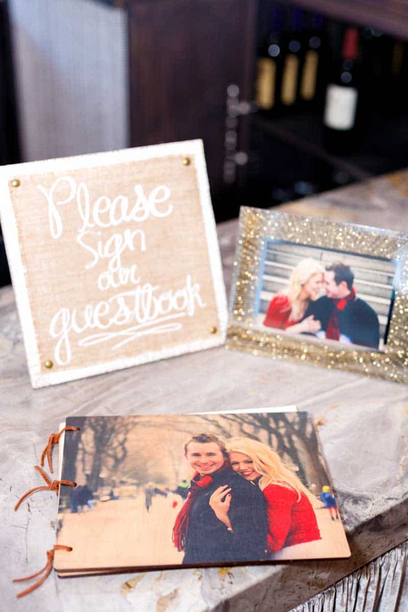 photo wedding guest book on rustic table