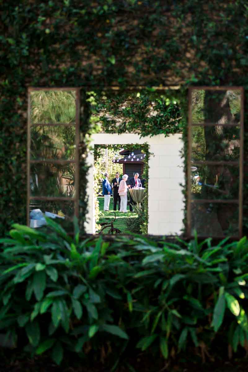 wedding guests standing for cocktail hour