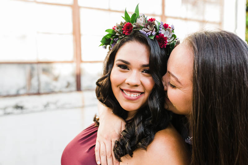 woman kissing fiance on the cheek