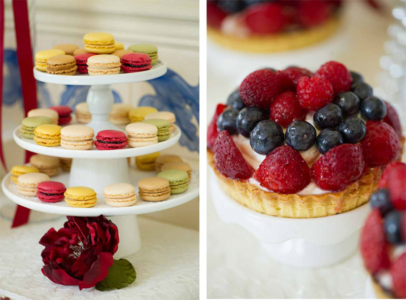 french macarons and berry tart on dessert table