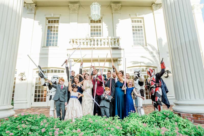 wedding party holding lightsabers in Downtown Orlando