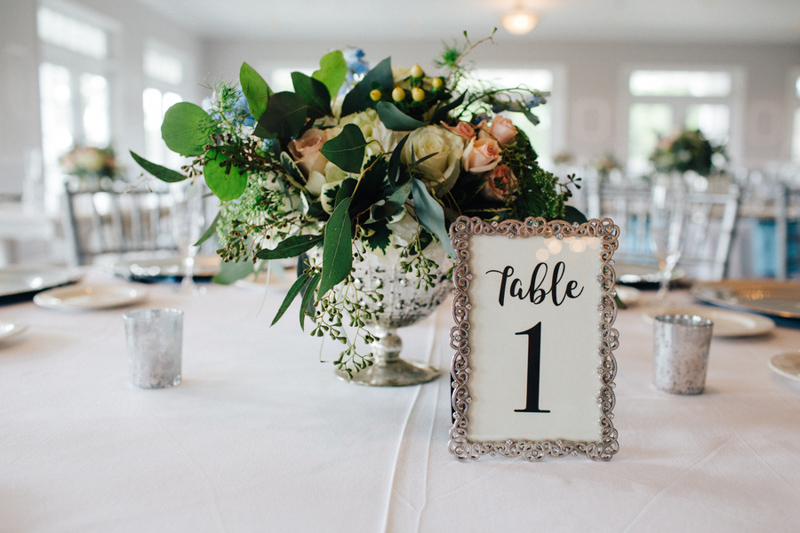 Silver framed table number on reception table